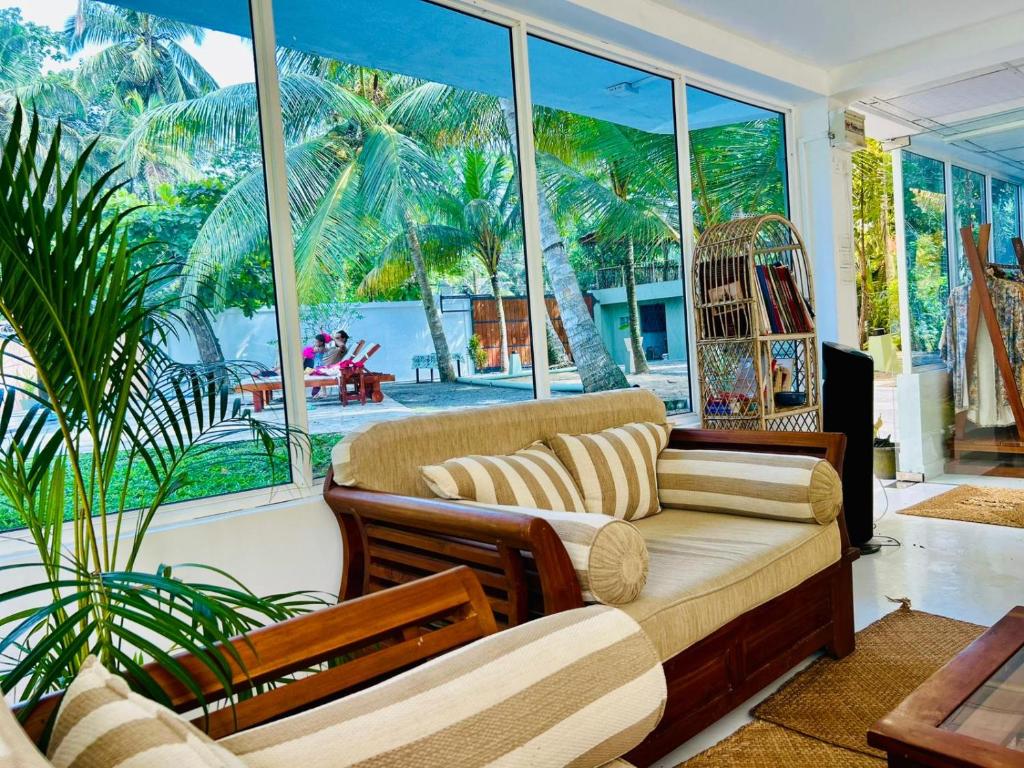 Et opholdsområde på Papaya Hikkaduwa