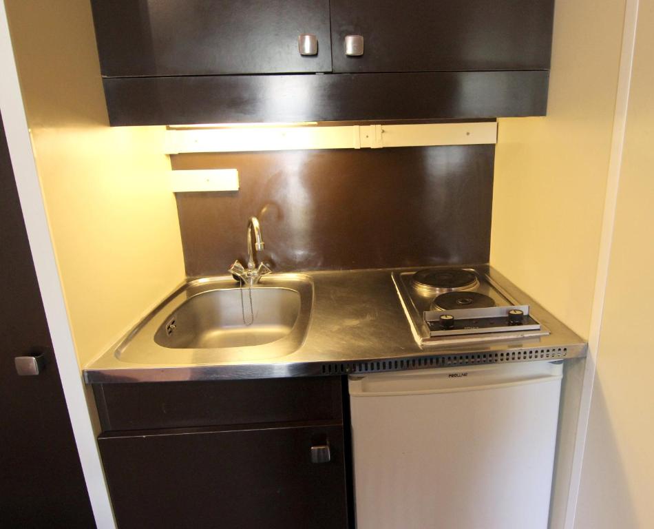 Kuchyň nebo kuchyňský kout v ubytování Roche Blanche Appartements VTI