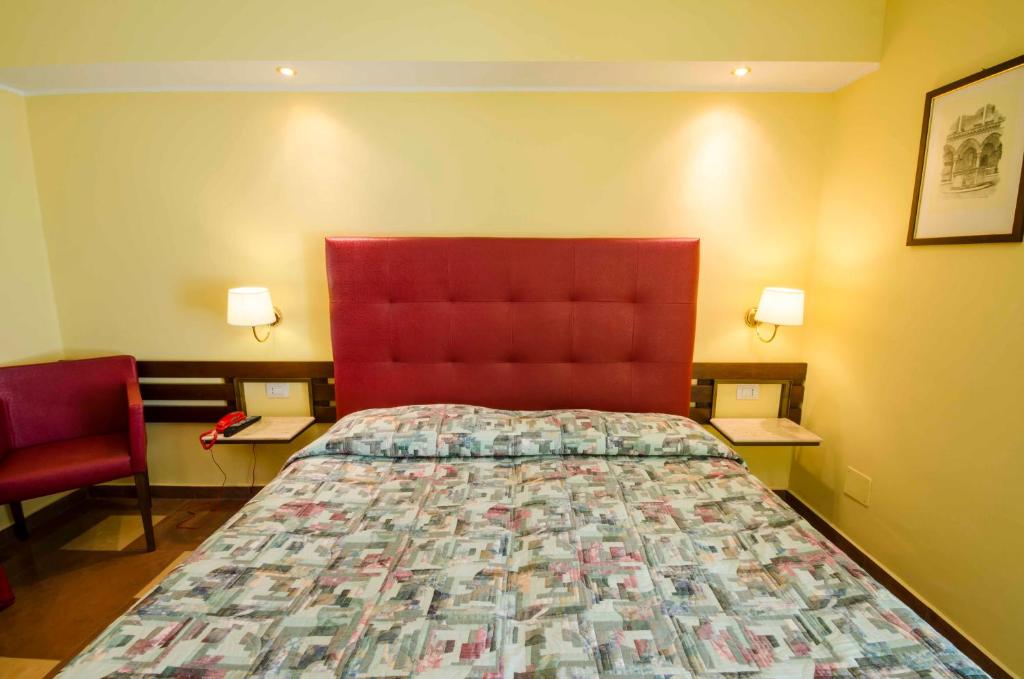 Postel nebo postele na pokoji v ubytování Hotel Tarconte