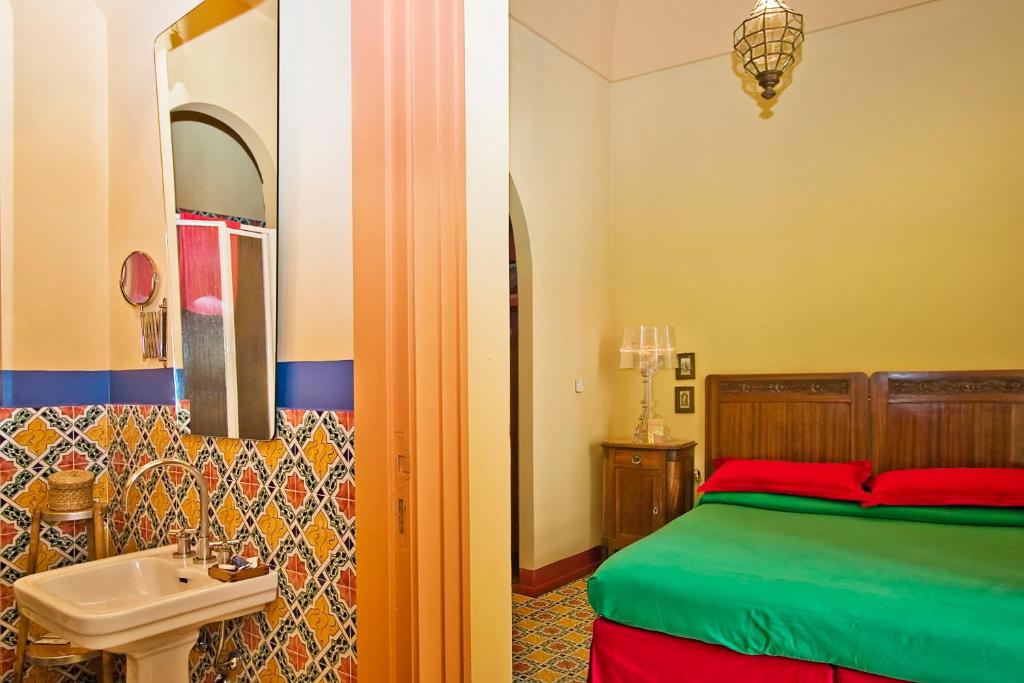 Postel nebo postele na pokoji v ubytování Casa Astarita