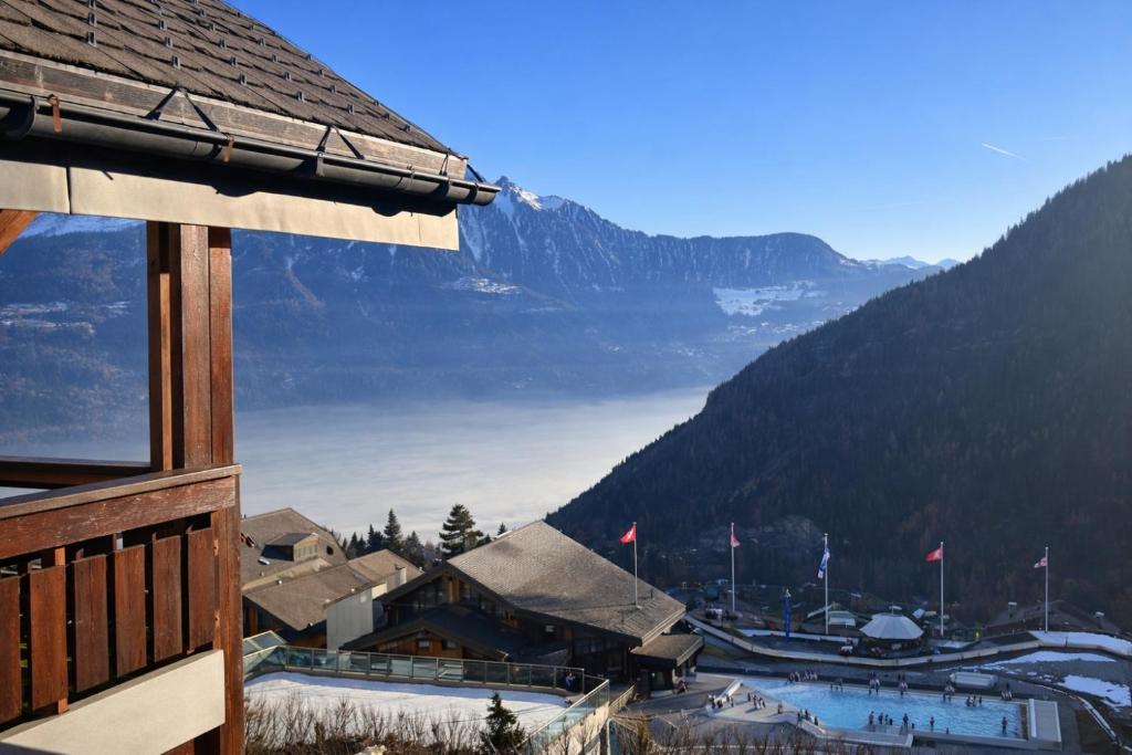 a view of a ski resort in the mountains at Alpstay - Résidences des Bains d'Ovronnaz - Studio SUD S204 in Ovronnaz