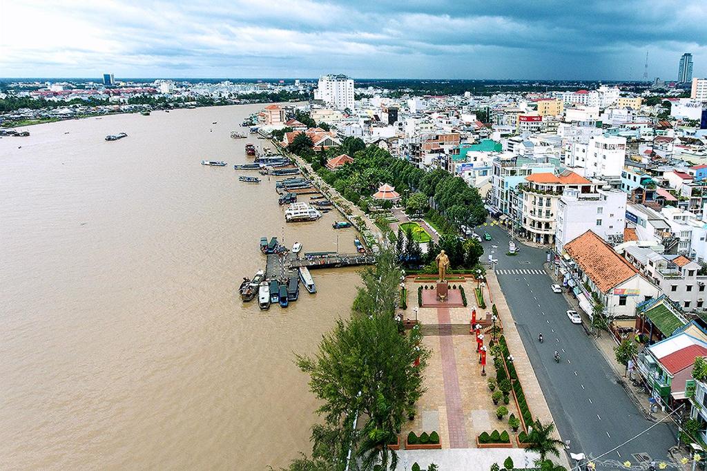 een luchtzicht op een stad naast een rivier bij Ruby Hotel - 2 Mins Walk to NovaWorld Phan Thiet in Phan Thiet