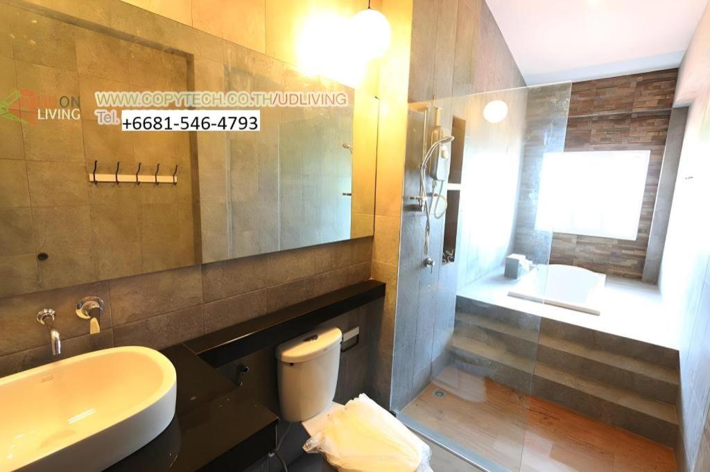 Et badeværelse på Maximize Brand New Hostel Udonthani