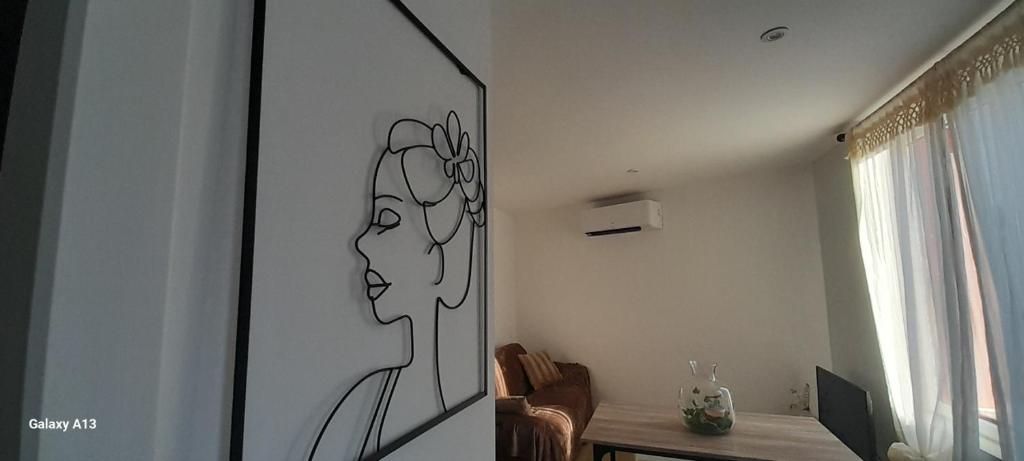 Et tv og/eller underholdning på Le petit gîte de la butte