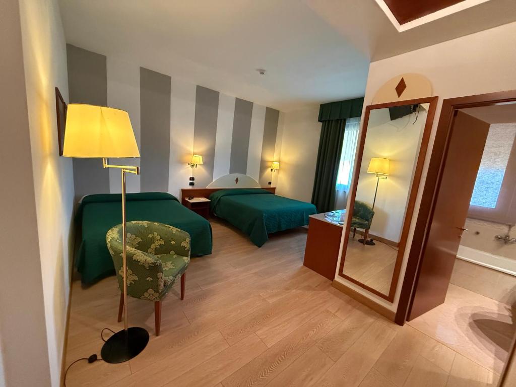 Hotel Le Ville - Habitación Cuádruple