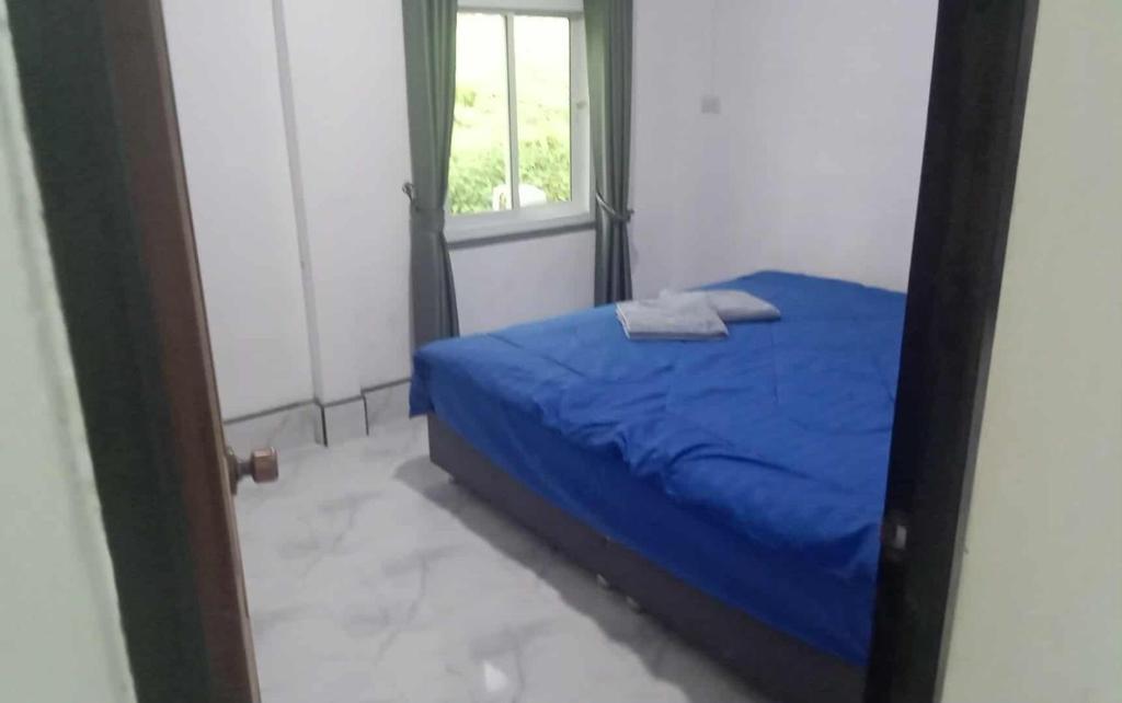 En eller flere senge i et værelse på private house khlongnin