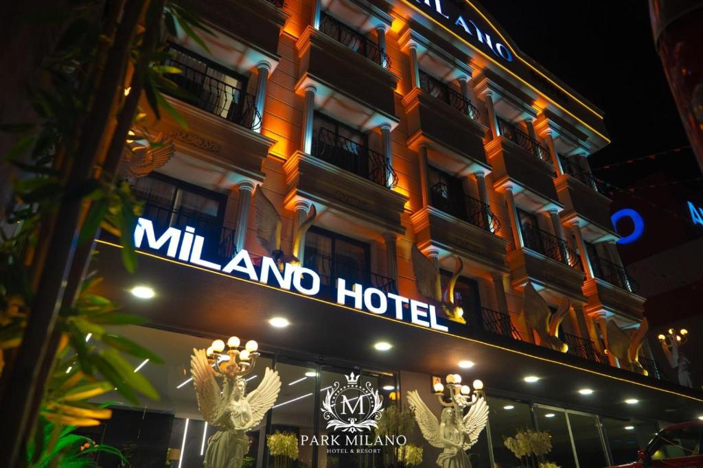a building with a sign that reads milano hotel at Park Milano Hotel in Izmir