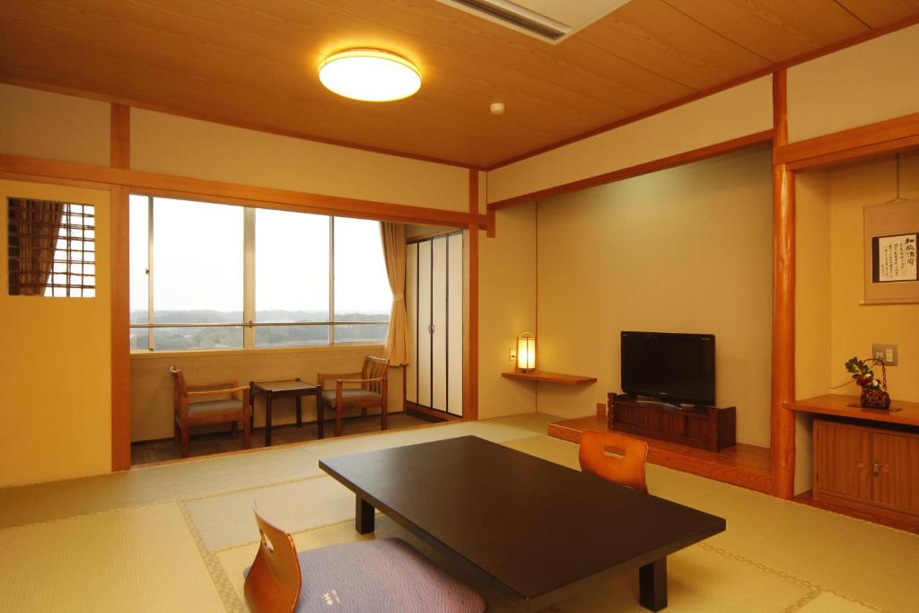 TV a/nebo společenská místnost v ubytování Kashikojima Park Hotel Michishio
