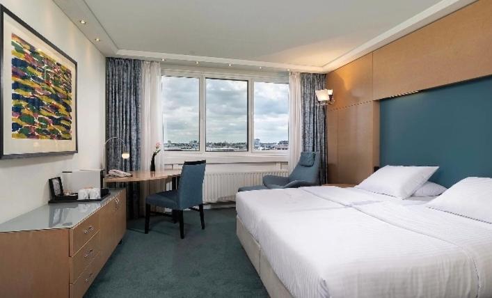 En eller flere senge i et værelse på Tot graind