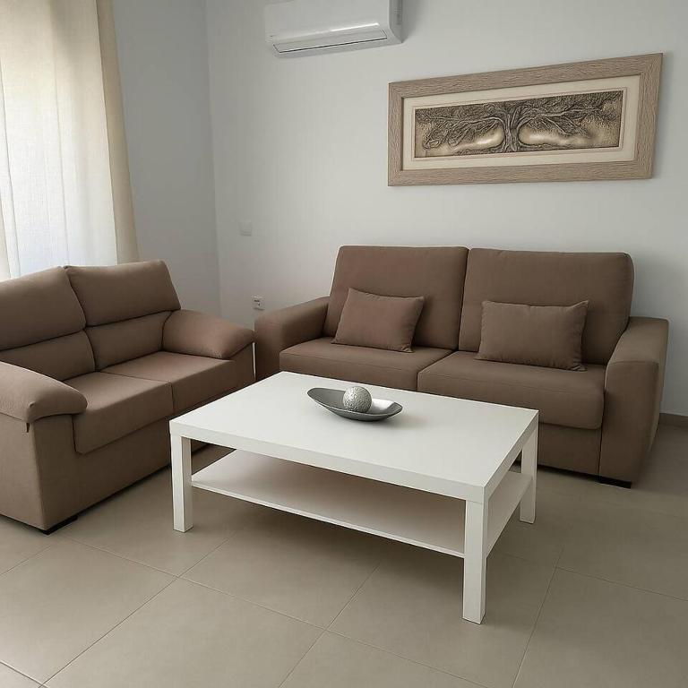 Khu vực ghế ngồi tại Alojamiento Baeza California 2A