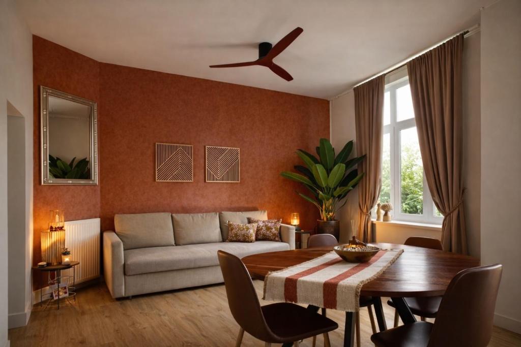 un soggiorno con un divano e un tavolo di SLEEP INN - Arizona flat with cityview ad Anversa