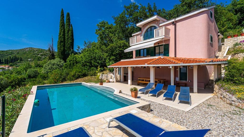 an image of a house with a swimming pool at Grand view Orasac by Villas Guide in Dubrovnik