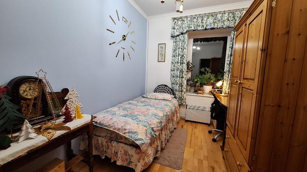 En eller flere senge i et værelse på Dom Pod Złotym Bażantem