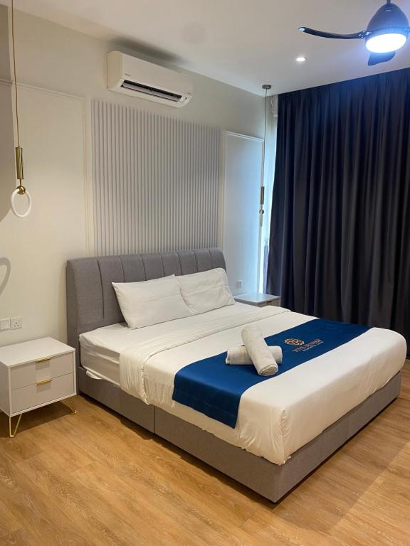 En eller flere senge i et værelse på Quill Residence Suites KLCC By Sara