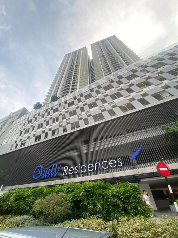a tall building with a sign that reads civil evidences at Quill Residence Suites KLCC By Sara in Kuala Lumpur