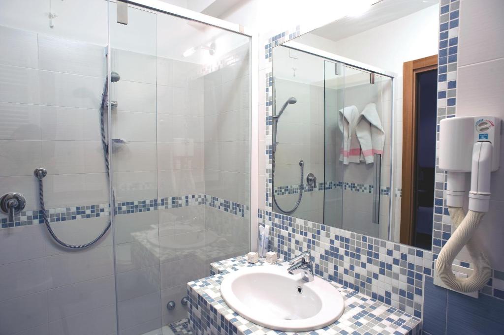 Koupelna v ubytování Hotel Sirio