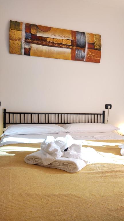 En eller flere senge i et værelse på All'Ombra di Santa Chiara, 140mq, 3 camere, Idromassaggio - Novità da MyAssisiSuite - Mówimy po polsku