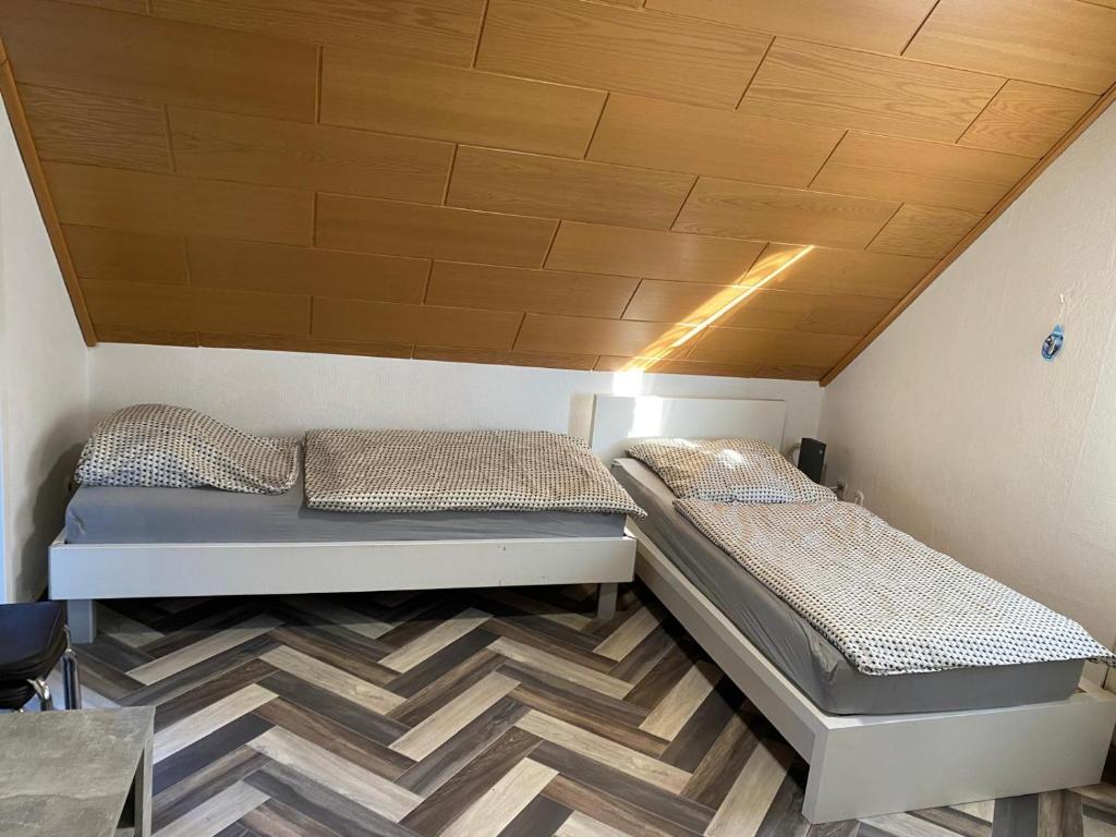 Postel nebo postele na pokoji v ubytování SHK - möbliert - WIFI - HAGEN