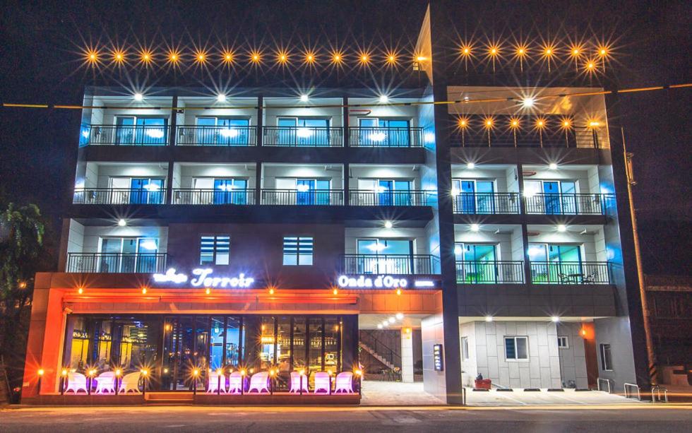 a large building with lights on top of it at Onda D'oro Hostel in Yeosu