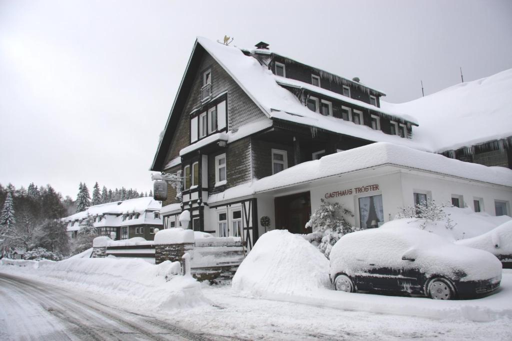 Hotel Gasthaus Tröster v zimě