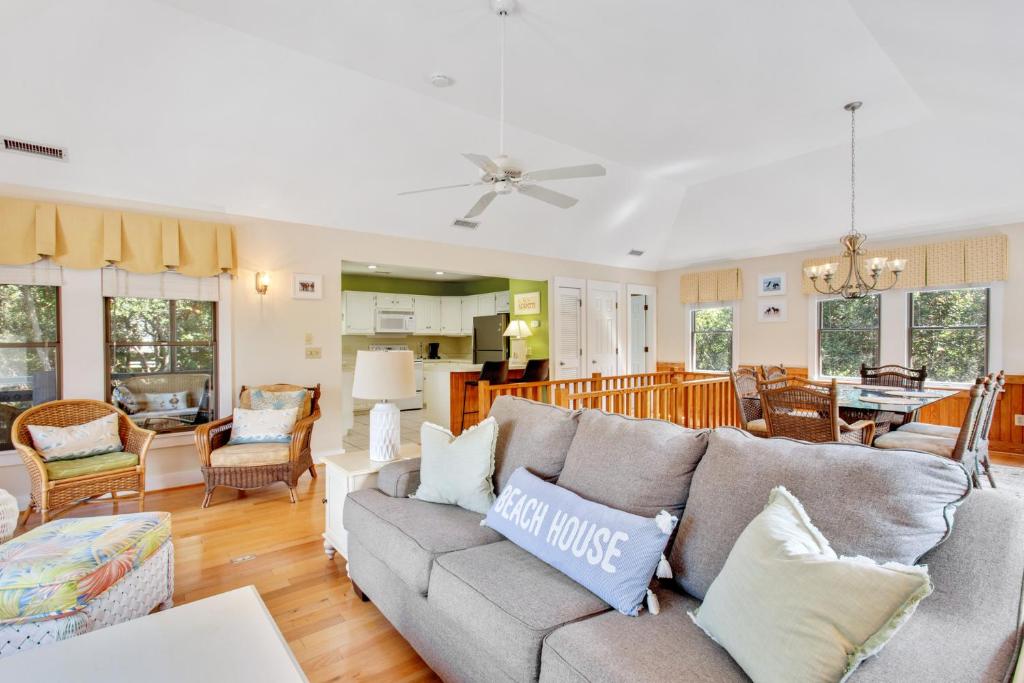 a living room with a couch and a table at 2002 - Hidden Aweigh in Sanderling