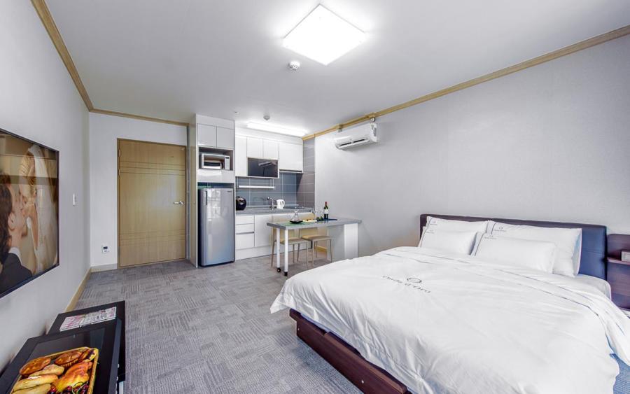 Kuchyň nebo kuchyňský kout v ubytování Onda D'oro Hostel