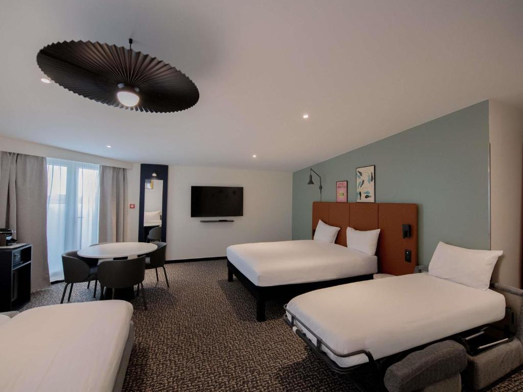 En eller flere senge i et værelse på ibis Paris Canal Saint Martin