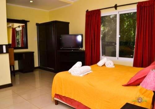 En eller flere senge i et værelse på Hotel Don Horacio