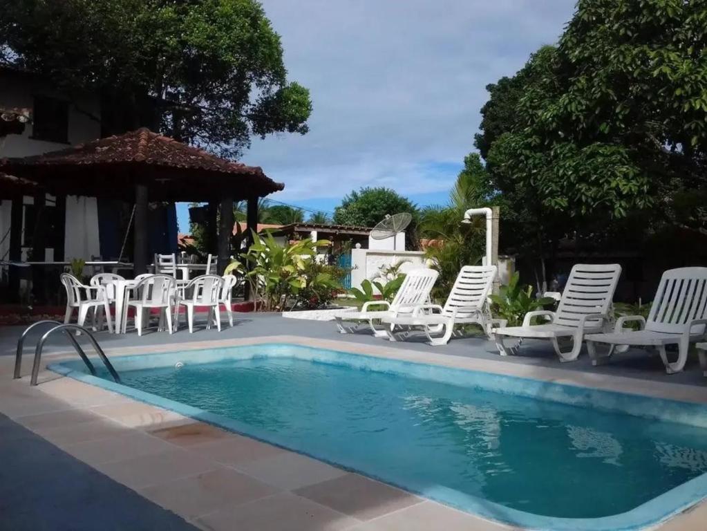 Swimmingpoolen hos eller tæt på Pousada Refúgio