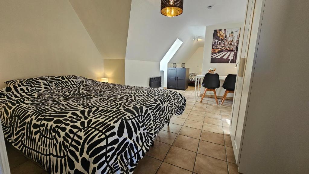 En eller flere senge i et værelse på Villa Gottem