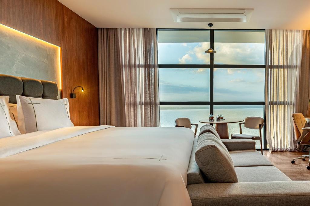 Postel nebo postele na pokoji v ubytování Tivoli Maiorana Belém Pará Hotel