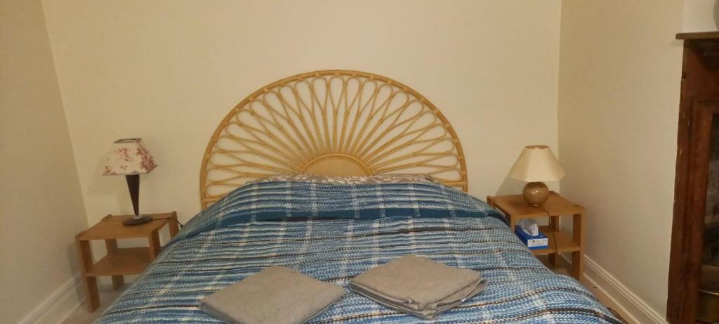 En eller flere senge i et værelse på Belle maison ancienne bien équipée avec vue