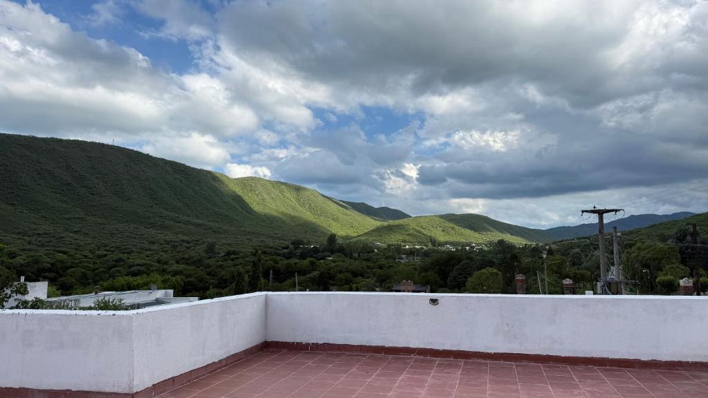 a white wall with a view of a mountain at El descanso in Rodeo