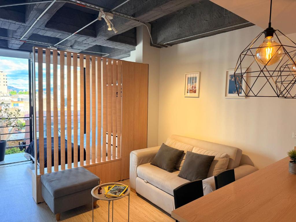 Khu vực ghế ngồi tại Elegante Loft Céntrico con Balcón