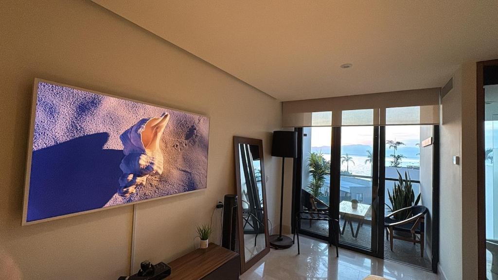 TV a/nebo společenská místnost v ubytování Beautiful apartment with ocean view