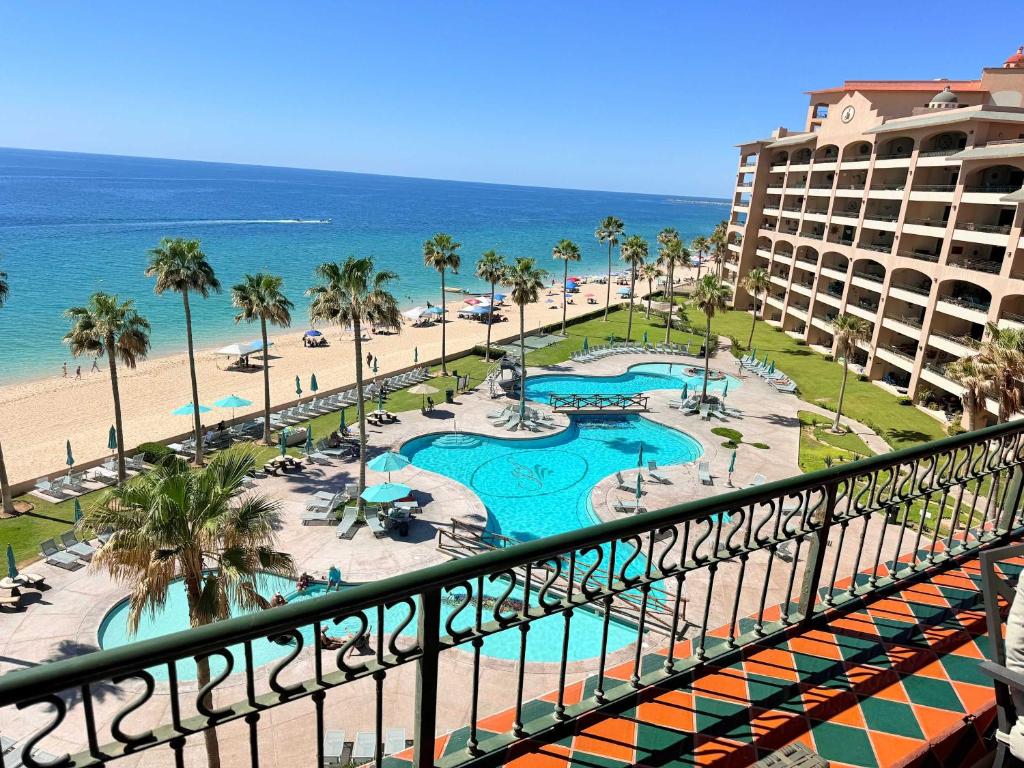 a view of the beach from the balcony of a resort at Sonoran Spa 2BR 2BA Sleeps 8 6th Floor- E607 in Campo del Medio