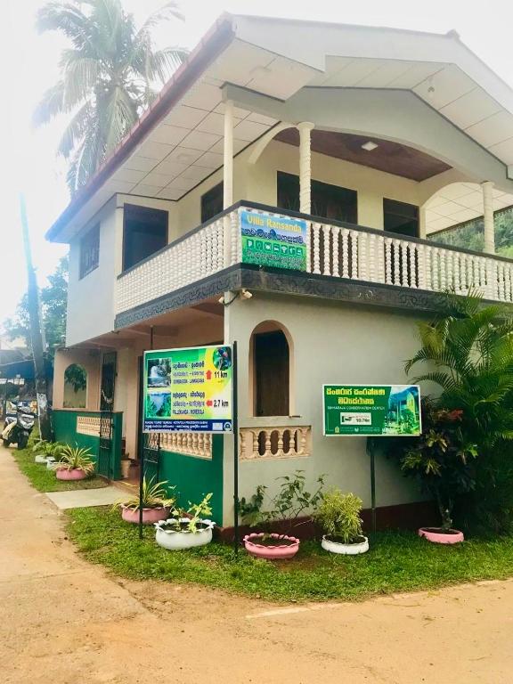a building with signs in front of it at Villa Ransanda in Warakagoda