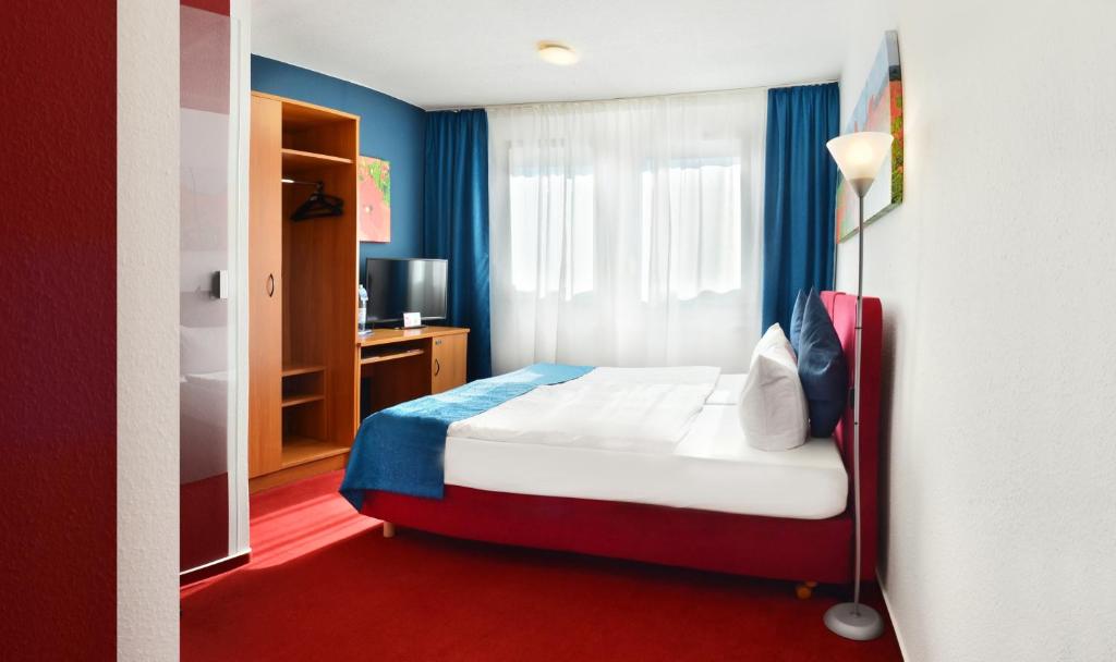 Кровать или кровати в номере centra Hotel