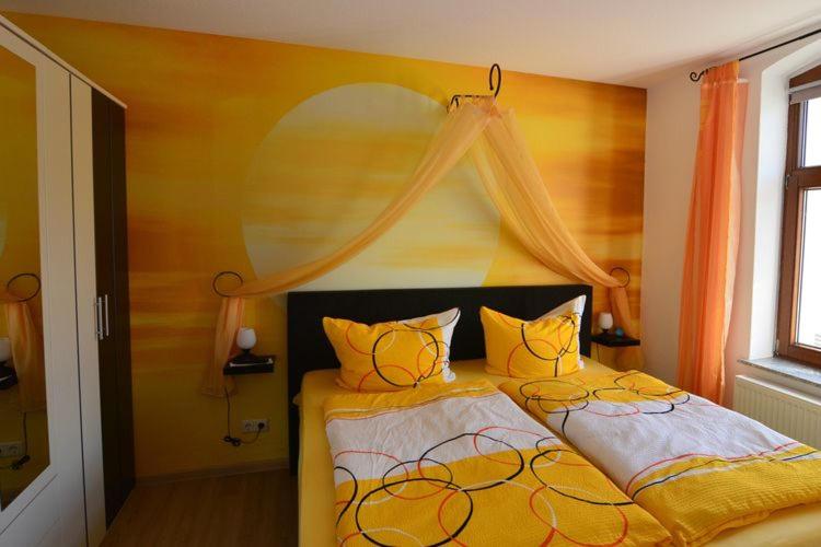Llit o llits en una habitació de Ferienhaus Wotan
