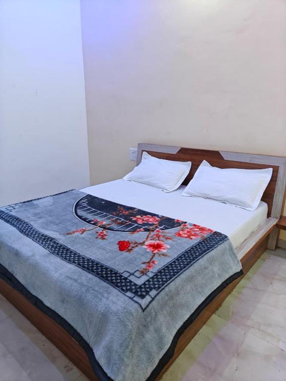 Lova arba lovos apgyvendinimo įstaigoje Hotel Ankit Palace