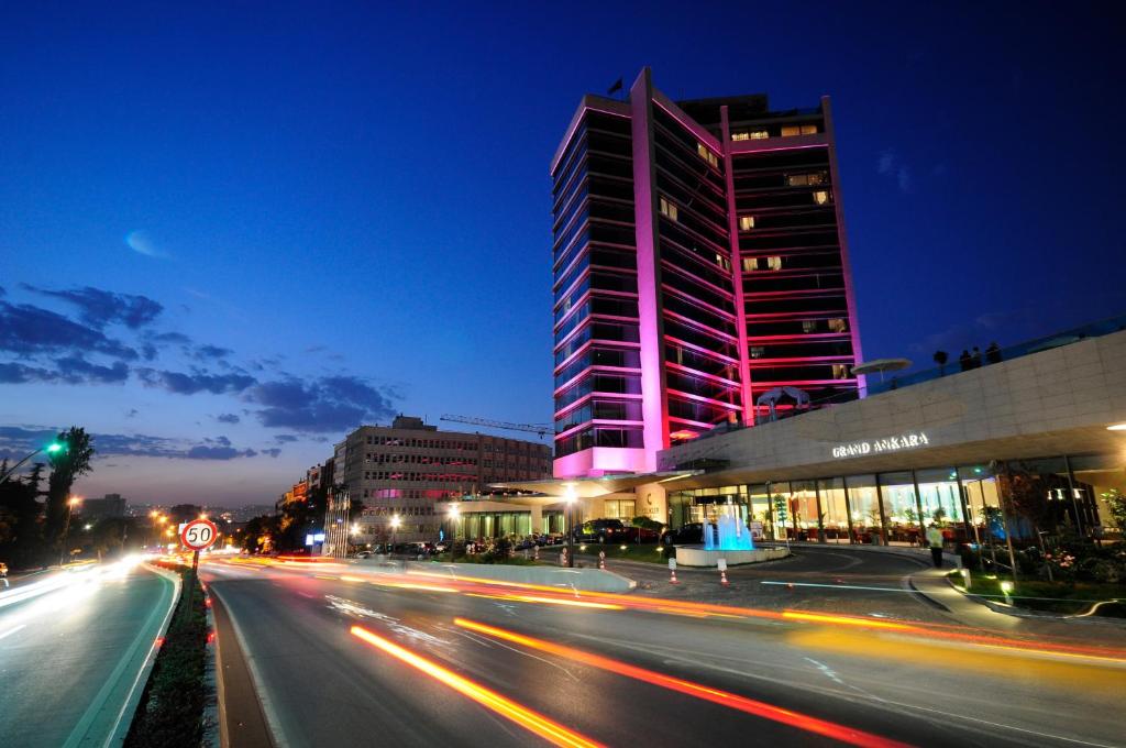 a city street at night with a tall building at Grand Ankara Hotel Convention Center in Ankara