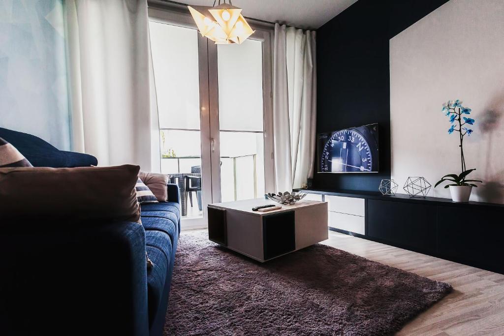 Televízia a/alebo spoločenská miestnosť v ubytovaní RGB studio