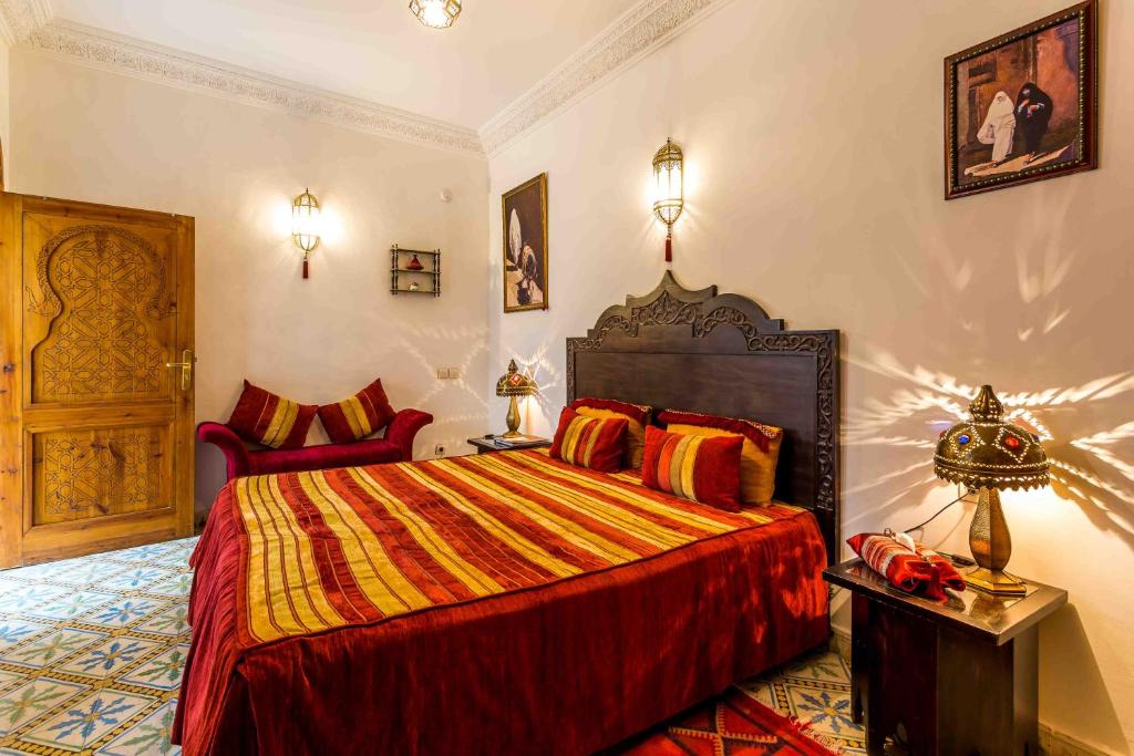 Postel nebo postele na pokoji v ubytování Riad Mouna