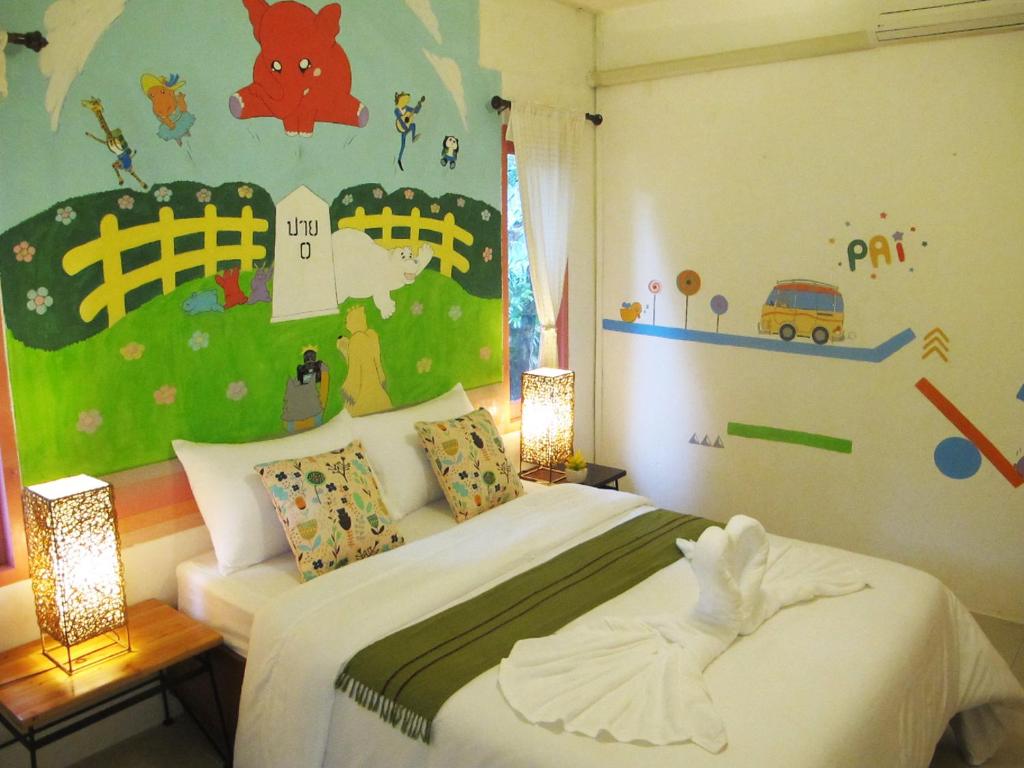 Postel nebo postele na pokoji v ubytování Baan Chokdee Pai Resort