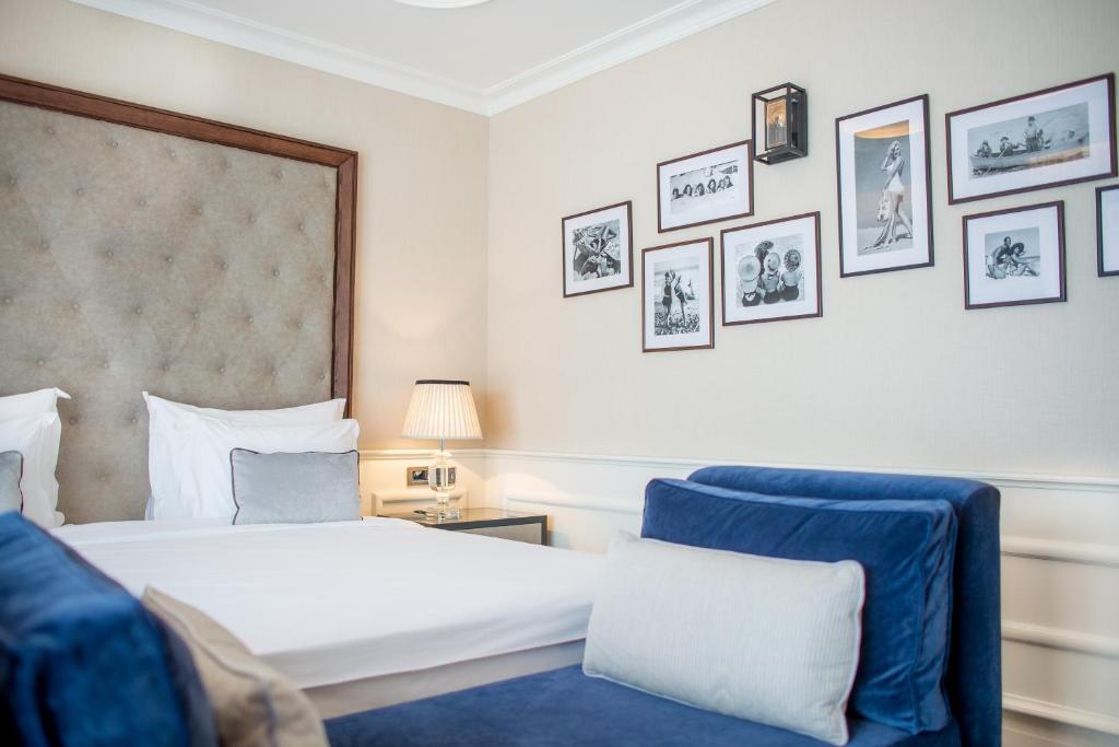 Postel nebo postele na pokoji v ubytování Boutique Hotel La Roche
