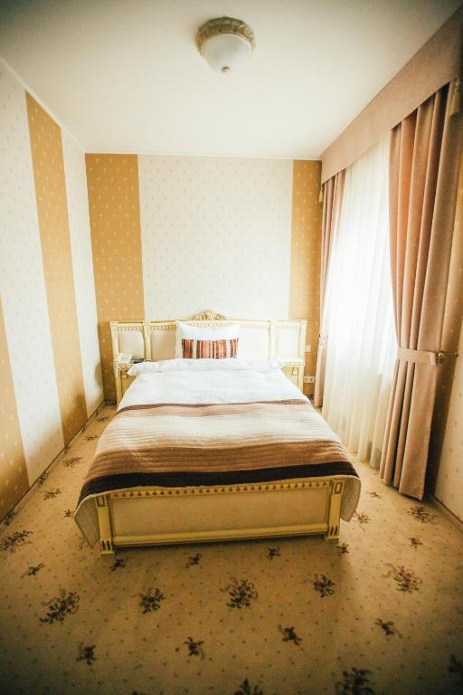 Postel nebo postele na pokoji v ubytování Prince