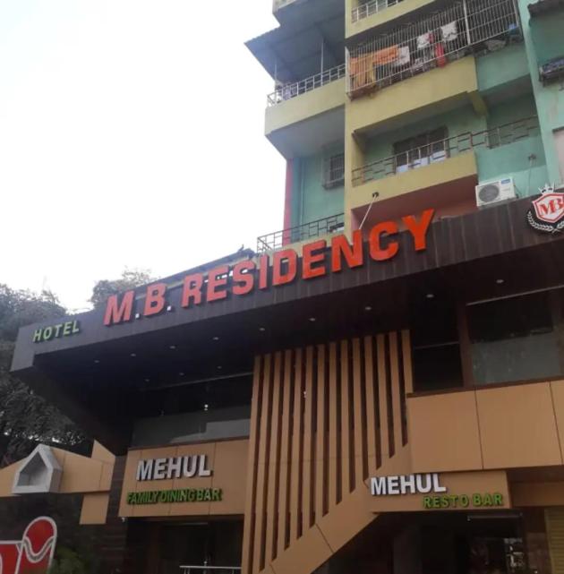 a building with a sign that reads mb electricityery at M B Residency Lodging and Boarding in Badlapur