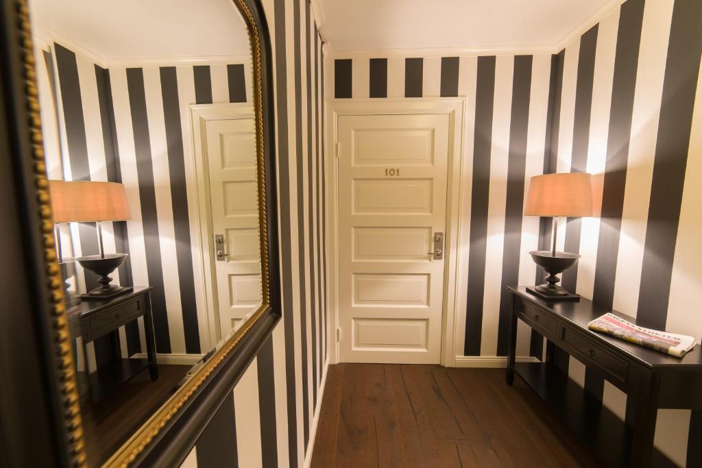 Postel nebo postele na pokoji v ubytování Hotell Stensborg