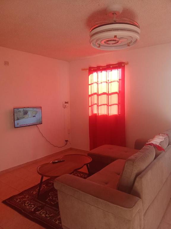 TV a/nebo společenská místnost v ubytování Cassiane apartments