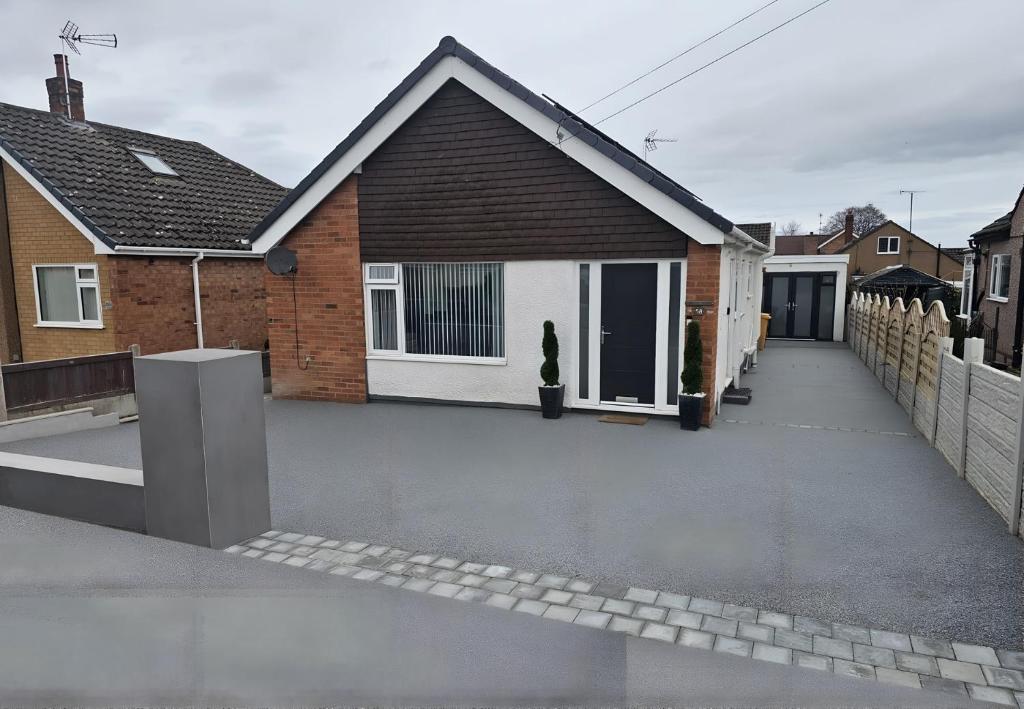 a driveway in front of a house at 58 Clifton Rise in Abergele